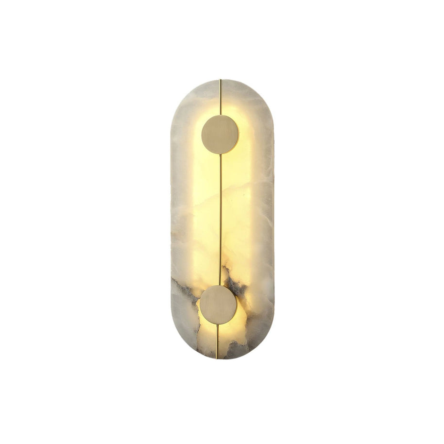 Wall light with a tall rounded alabaster panel, a slim brass rod and two brass discs lit on a white background, shown small.