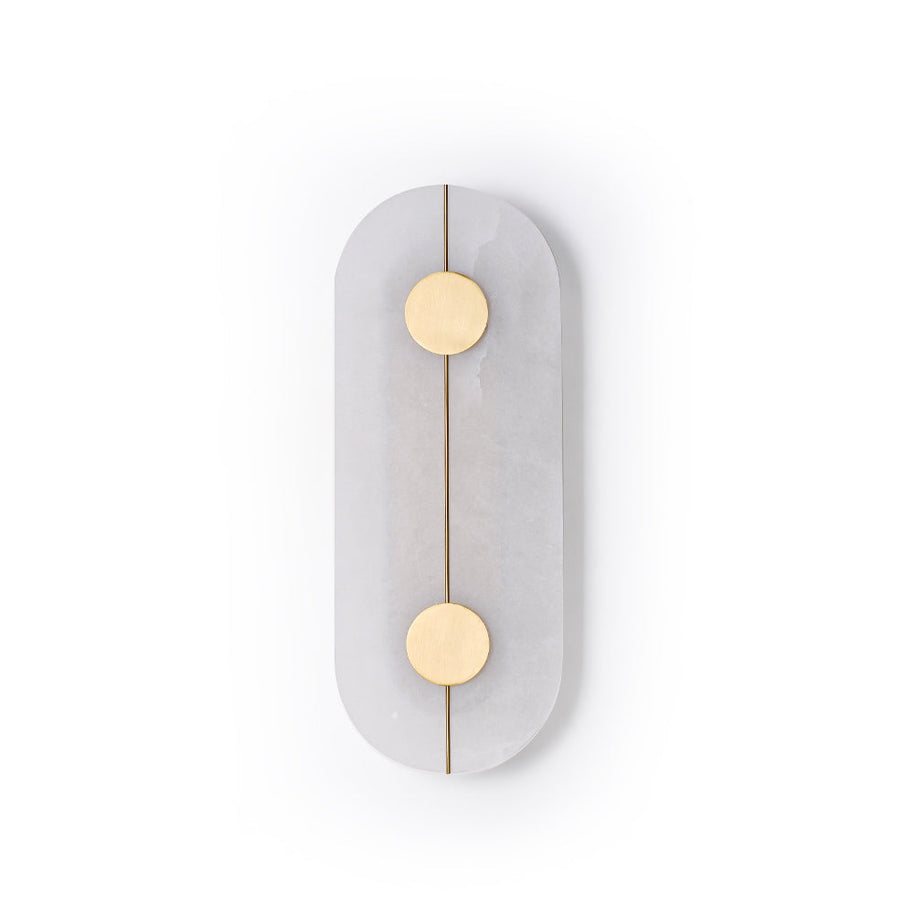 Wall light with a tall rounded alabaster panel, a slim brass rod and two brass discs, unlit, on a white background.