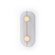 Wall light with a tall rounded alabaster panel, a slim brass rod and two brass discs, unlit, on a white background.