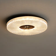 Ayla LED Flush Mount Ceiling Light in the black and opaque acrylic finish, lit and ceiling mounted