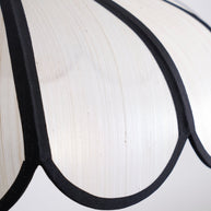 Close view of the shade surface showing its woven texture and a dark rib.