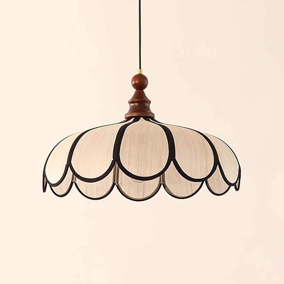 Pendant light with a scalloped beige shade, dark ribs and a turned walnut-coloured wooden top, shown large on a plain background.