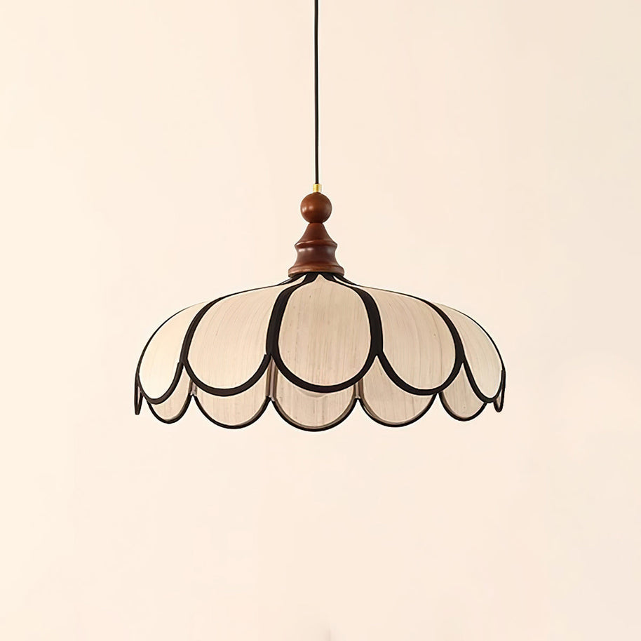 Pendant light with a scalloped beige shade, dark ribs and a turned walnut-coloured wooden top, shown on a plain background.