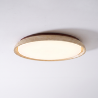 Pietra Walnut Travertine Ceiling Light in walnut colour and beige, installed in a plain interior.