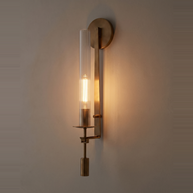 Valenne Ribbed Glass Wall Sconce lit at dusk on a warm limewash wall