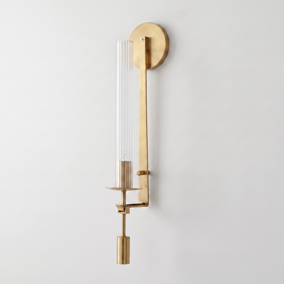 Valenne Ribbed Glass Wall Sconce in brass and clear ribbed glass, complete, on a plain studio background.