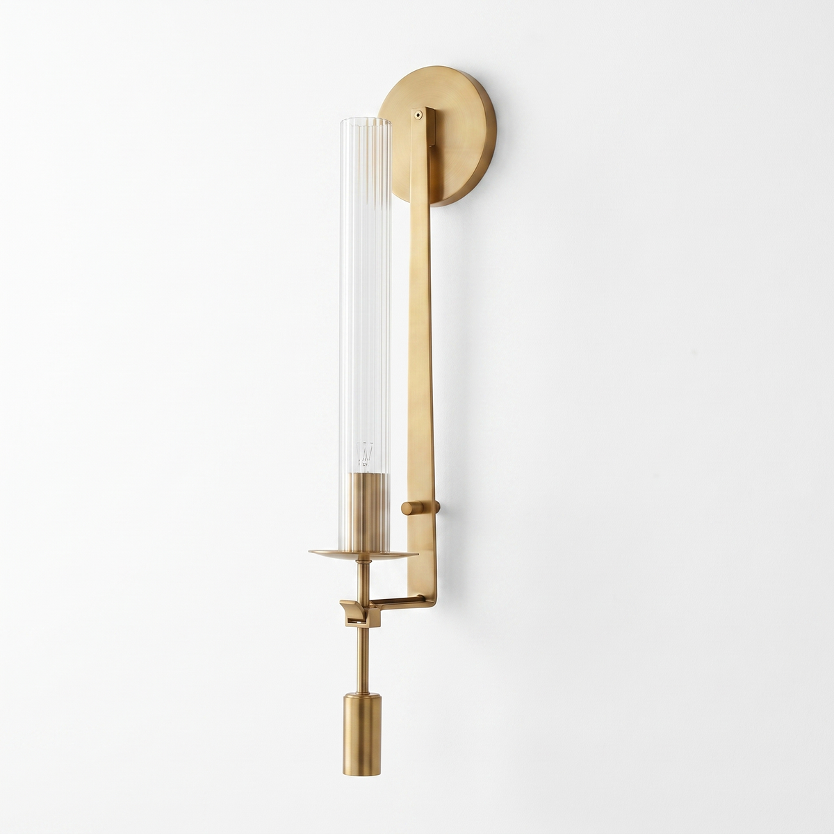 Valenne Ribbed Glass Wall Sconce in brass and clear ribbed glass, studio view