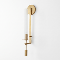 Valenne Ribbed Glass Wall Sconce in brass and clear ribbed glass, studio view