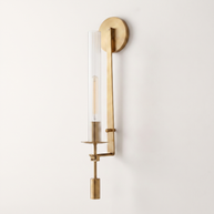 Valenne Ribbed Glass Wall Sconce, three-quarter studio view of the brass arm and ribbed glass cylinder