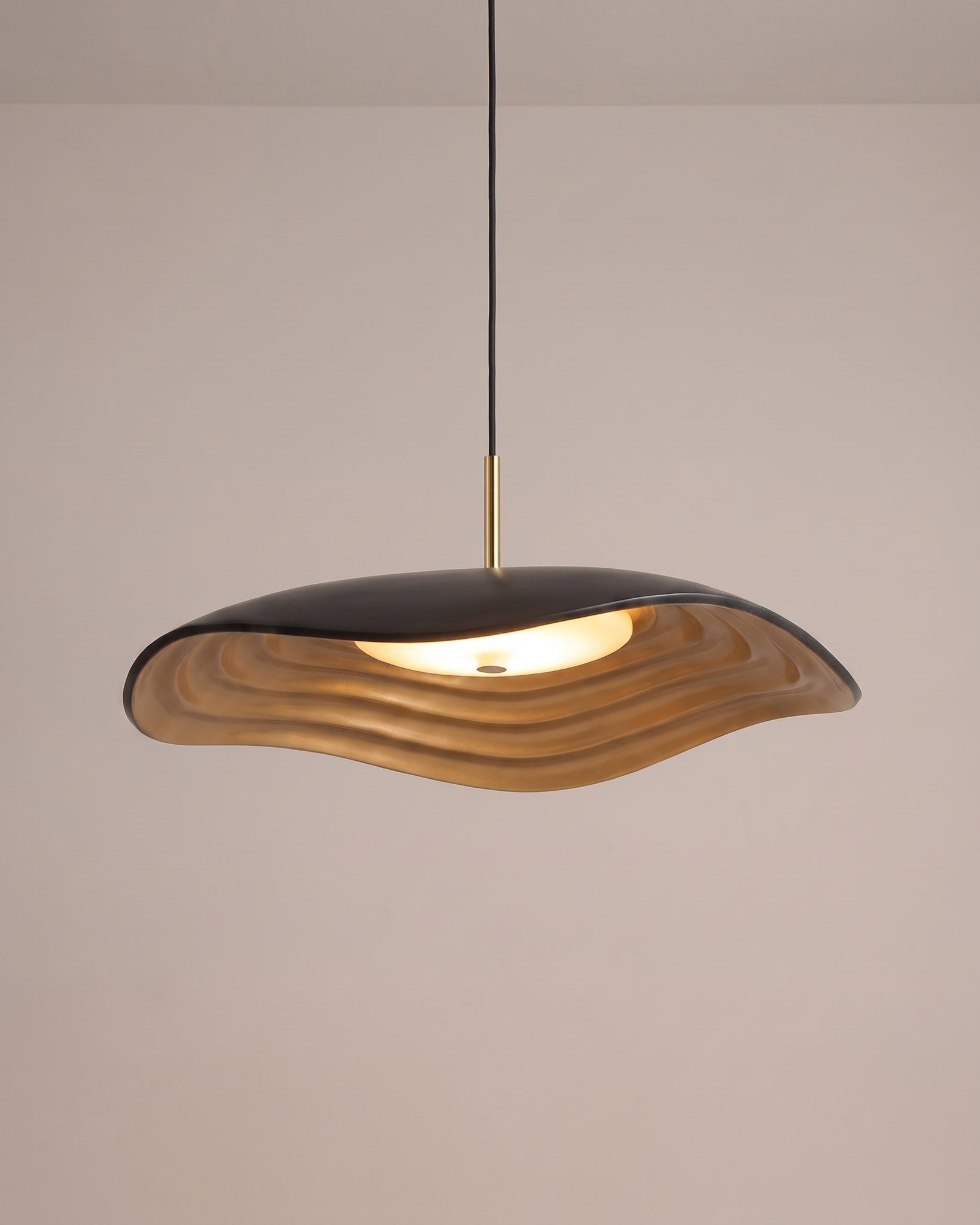 Comvilo Valentina Pendant Lamp in black resin and acrylic, installed in a plain interior.