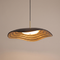 Comvilo Valentina Pendant Lamp in black resin and acrylic, shown lit with warm light.