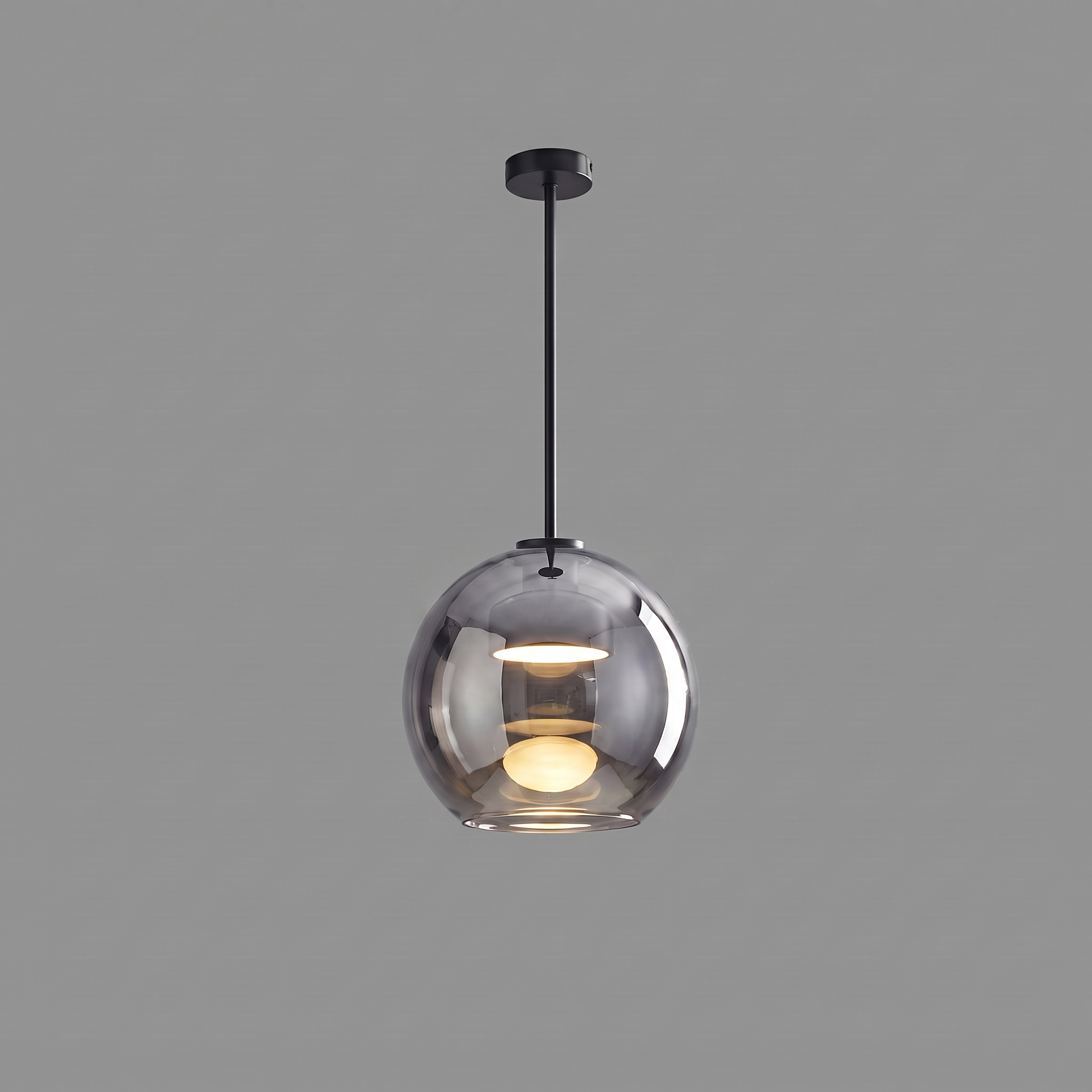 Comvilo Metro Sphere Glass Pendant Lamp in black metal and smoke-grey glass, complete, on a plain studio background.