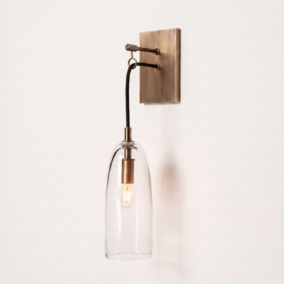 Comvilo Lure Wall Lamp in brass and clear, showing construction and wall mounting.