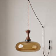 Orlena Antique Brown Glass Plug-In Pendant in antique brown glass, installed, from a different vantage.