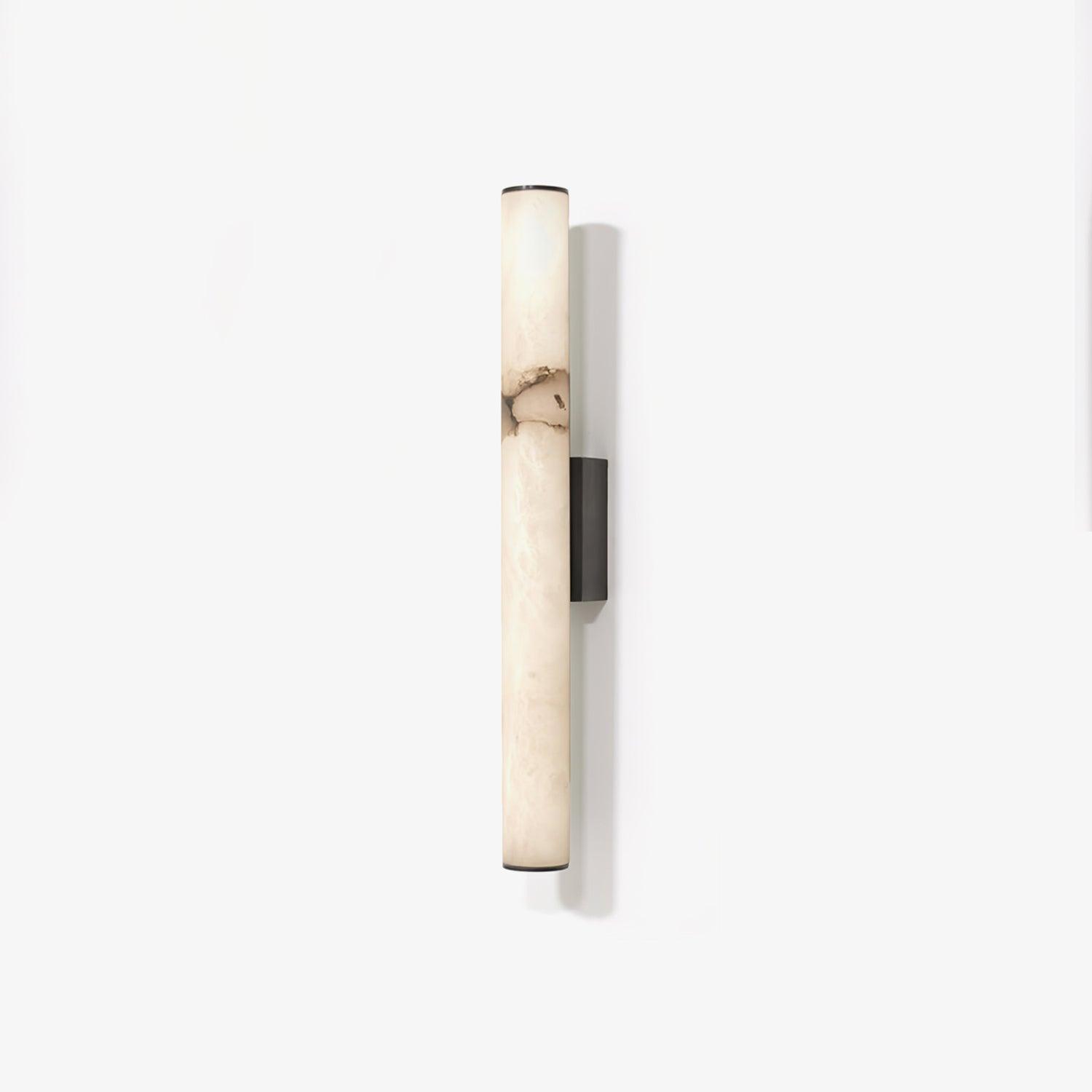 Wall lamp with a long pale veined stone-look tube and a dark bracket, unlit, on a white background, seen straight on.