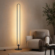 Haloform Modern Minimalist LED Standing Oval Floor Lamp - reading nook lifestyle image for Comvilo lighting