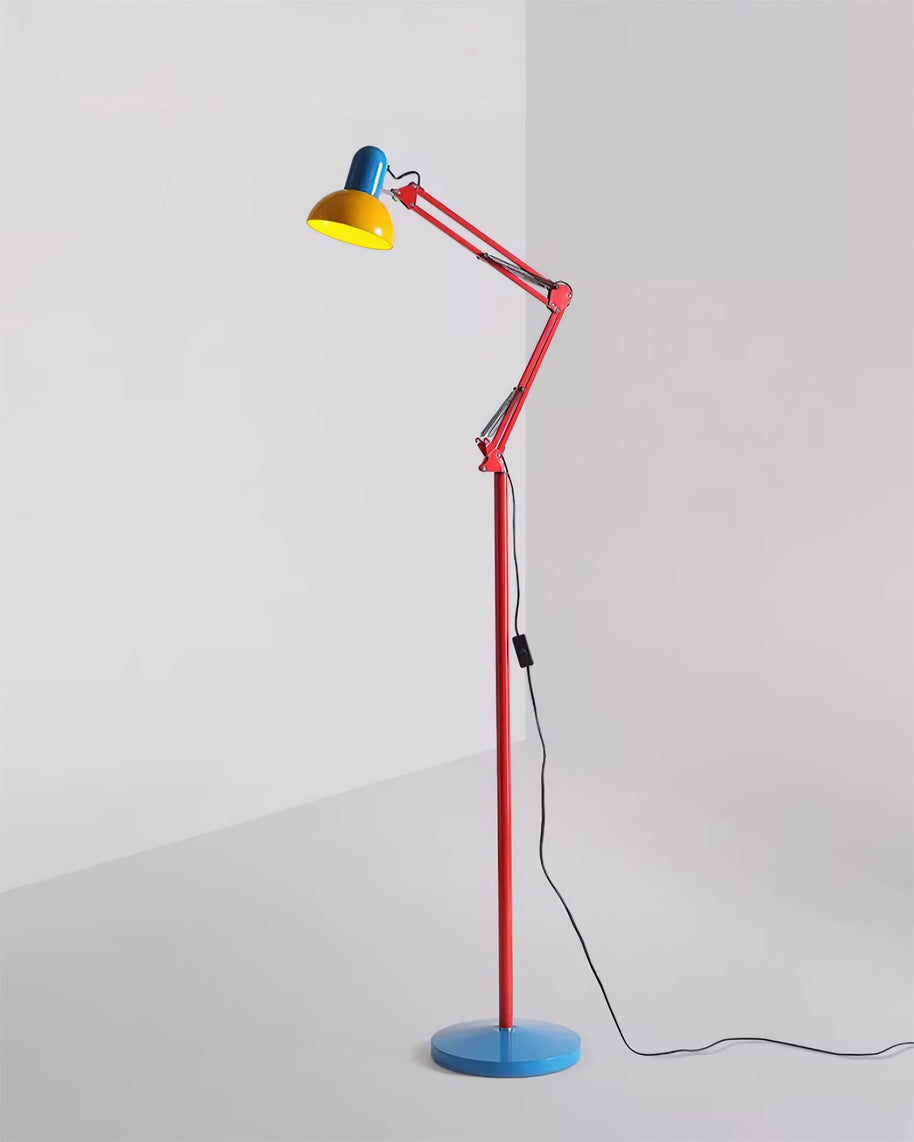 Adjustable floor lamp with a red arm, yellow shade and round blue base shown full length on a plain background.