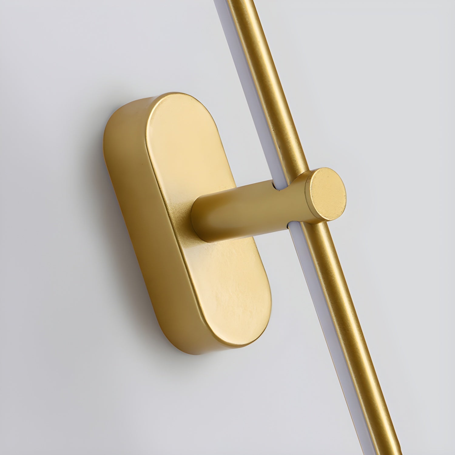 Close-up of the Gold finish and oval wall mount of the Kady Linear Rechargeable Version Wall Lamp