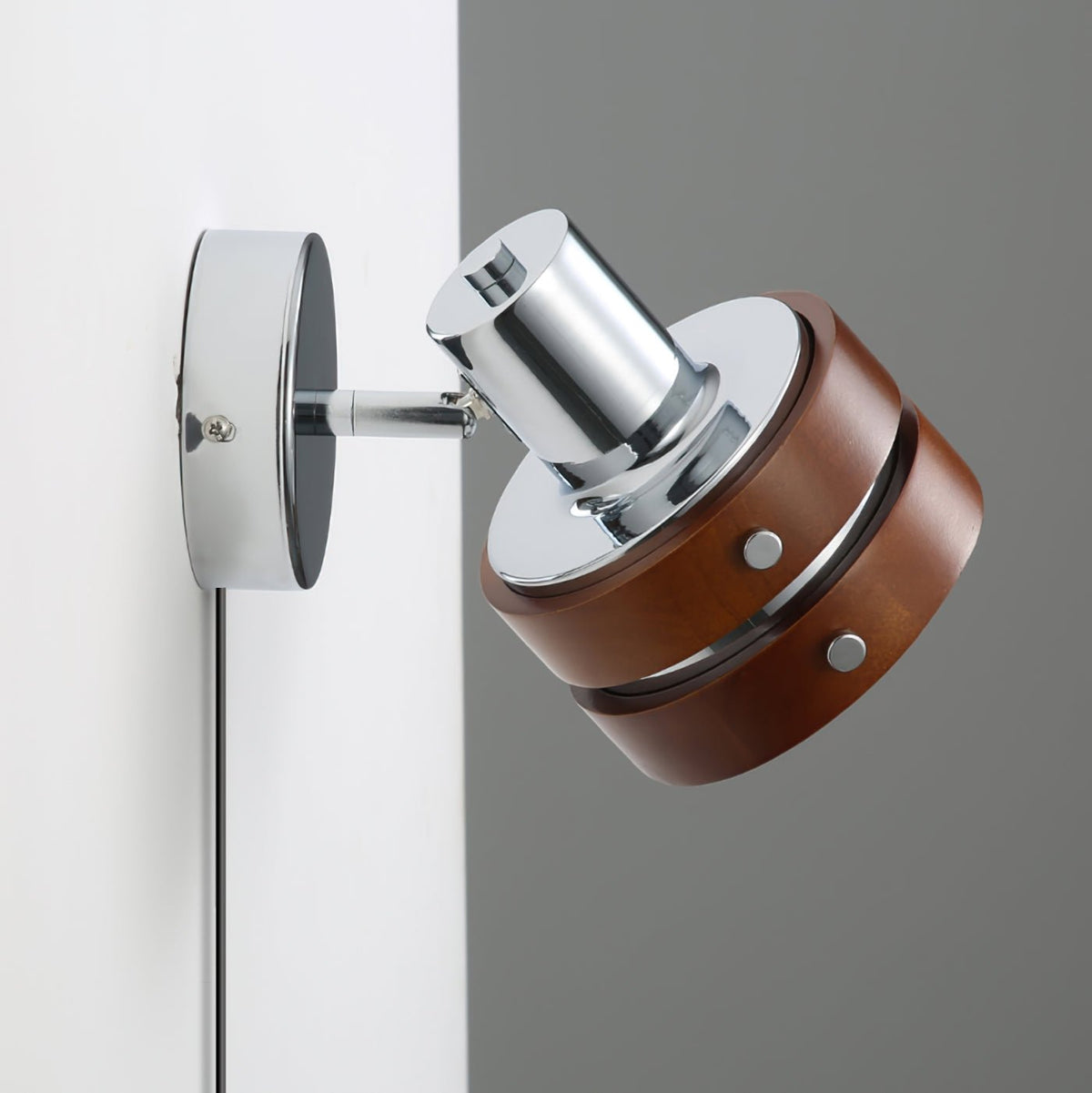 Karrivelle Wall Light, side view of walnut bands and chrome