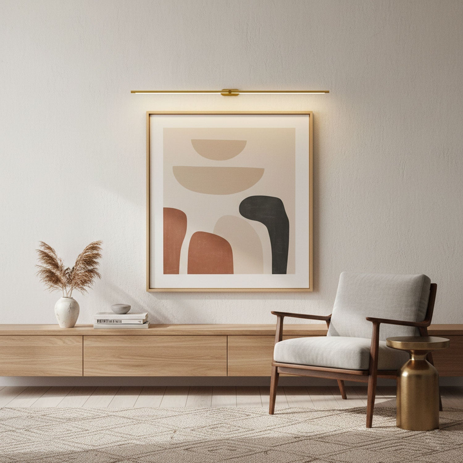 Gold slim linear LED wall light lit above a framed print in a neutral living room