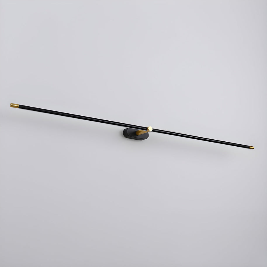 Black and gold slim linear LED wall light on an oval wall plate, three-quarter view showing the full bar length on a plain grey background