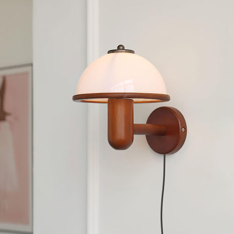 Mushroom Wood Wall Lamp angled view mounted on a plain wall