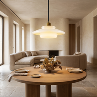 Elowen Mid Century Plug-in Milk White Glass Pendant Light in a premium Comvilo lifestyle interior — carousel lifestyle image 1