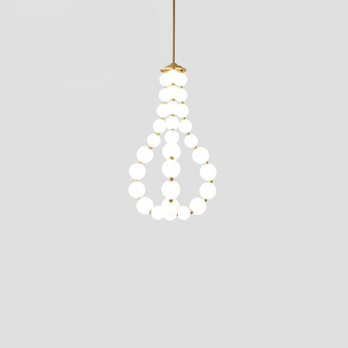 Perloria Chandelier, short teardrop arrangement of lit opal globes on a brass stem