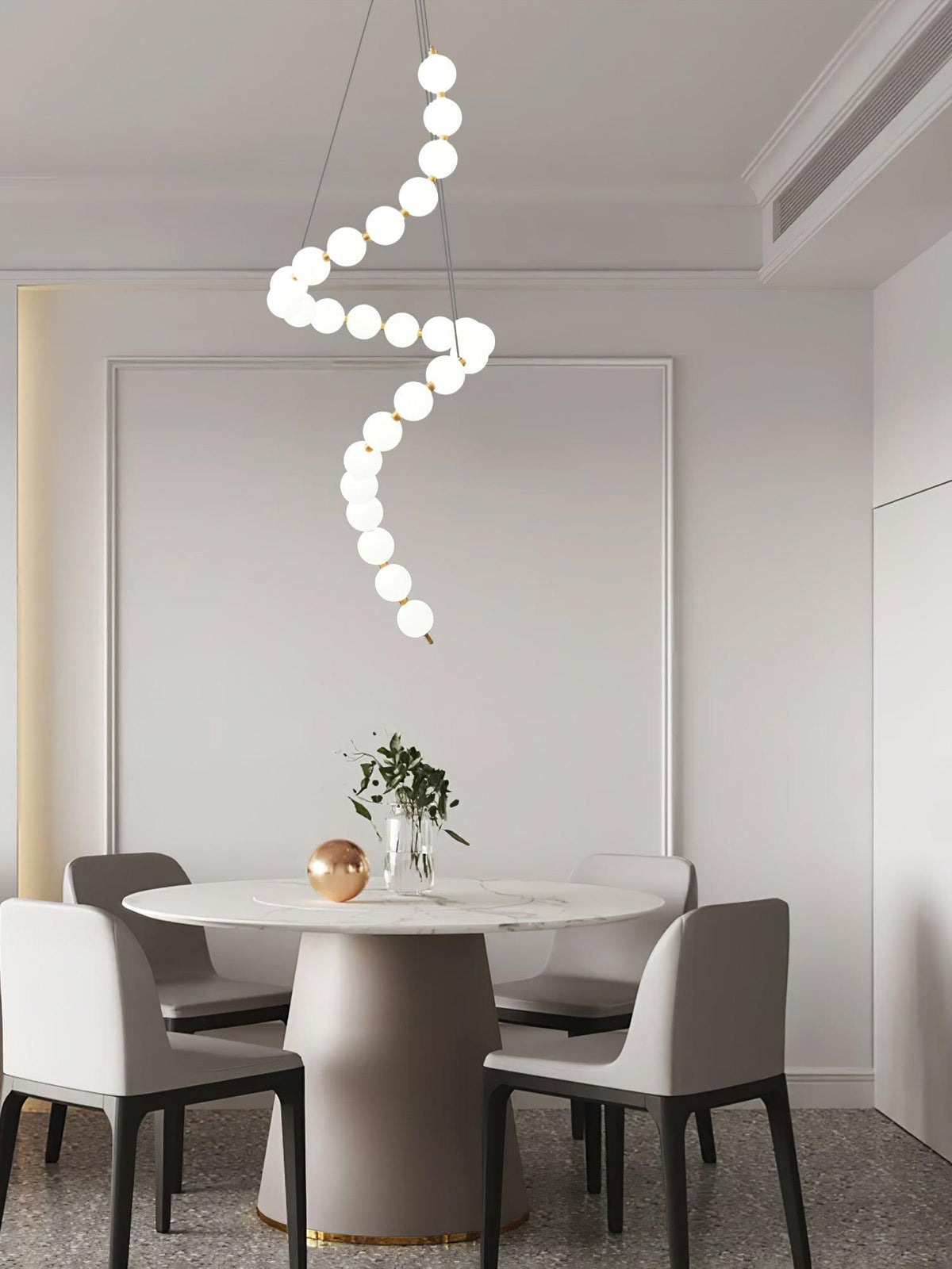 Perloria Chandelier, spiral strand of opal globes above a round dining table