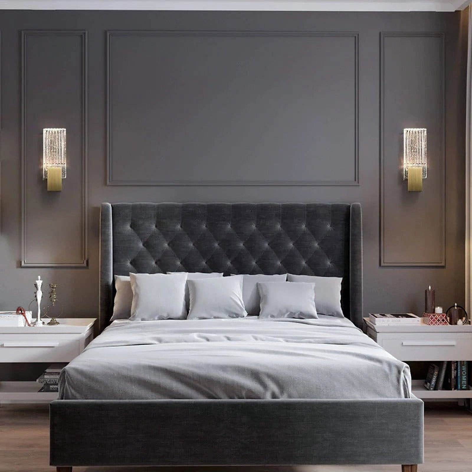 Two of the wall lights either side of a bed on a panelled wall.