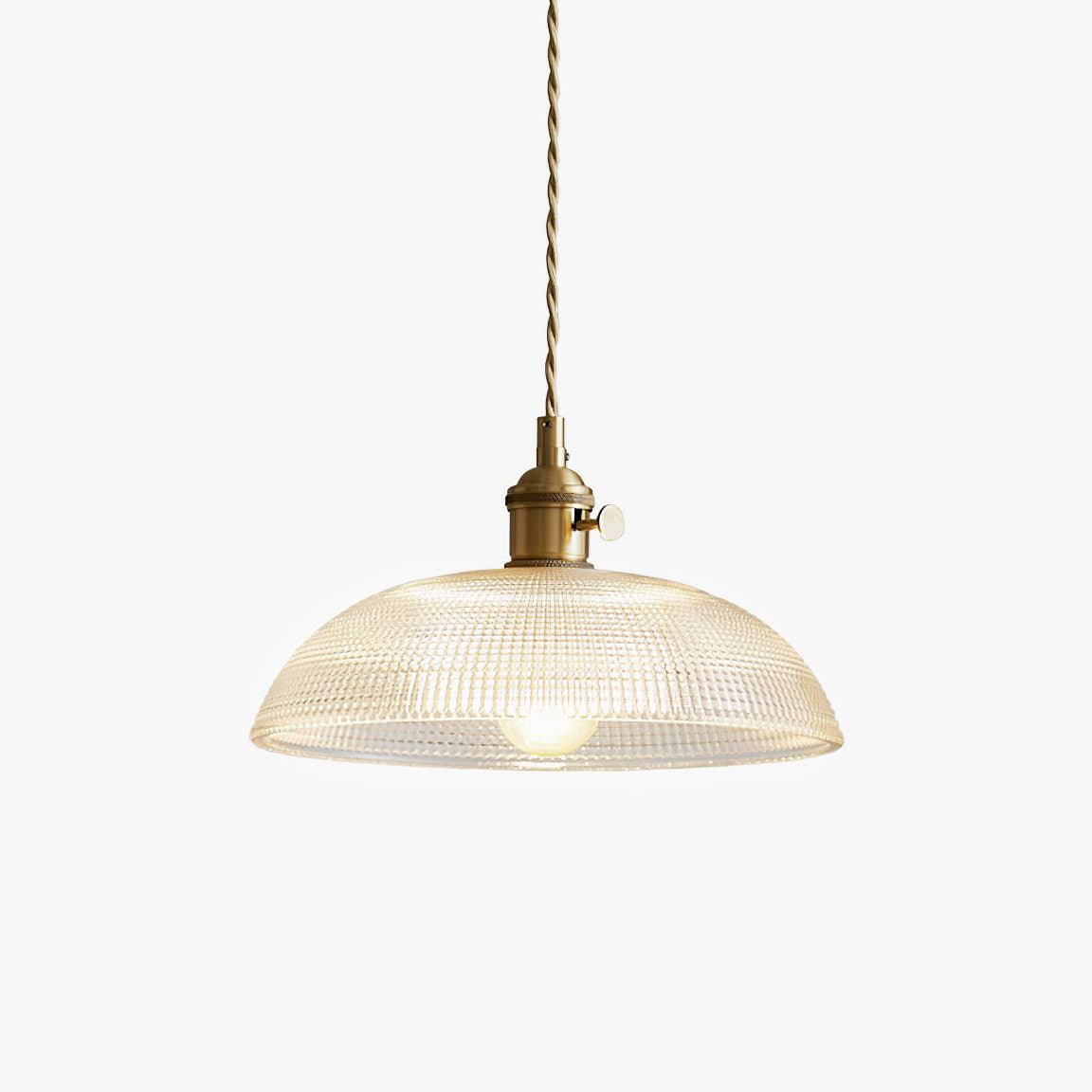 Pendant light with a ribbed glass dome shade and a gold-toned lamp holder, lit, shown on a white background.