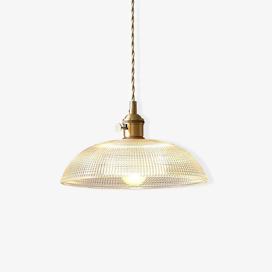 Pendant light with a ribbed glass dome shade and a gold-toned lamp holder, lit, shown small on a white background.