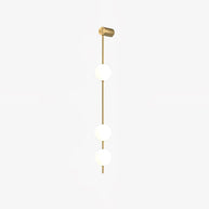 Wall lamp with a vertical row of white ball shades on a slim gold-toned rod, unlit, on a plain white background.