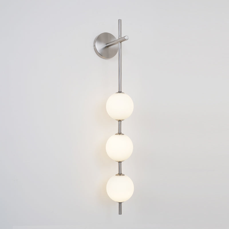 Solenne Vertical Globe Wall Light in Nickel, 3.9 in dia x H 30.7 in - Comvilo lighting