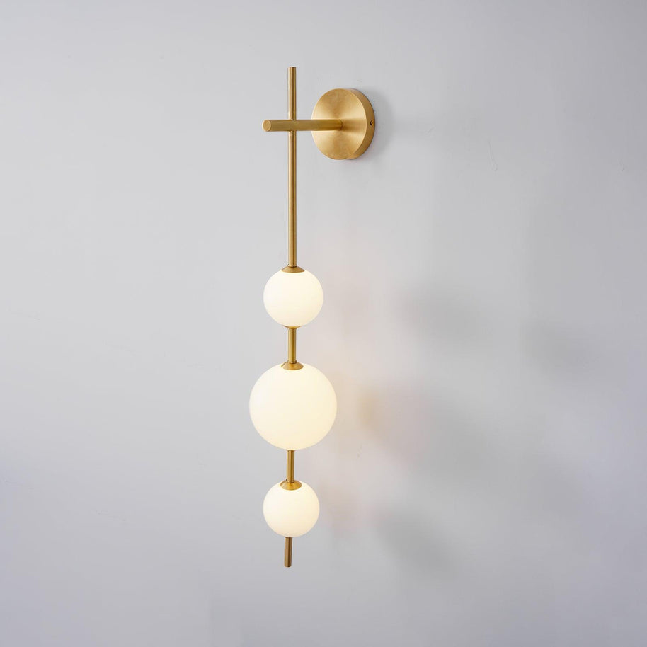 Solenne Vertical Globe Wall Light in Brass, 5.9 in dia x H 33.5 in - Comvilo lighting