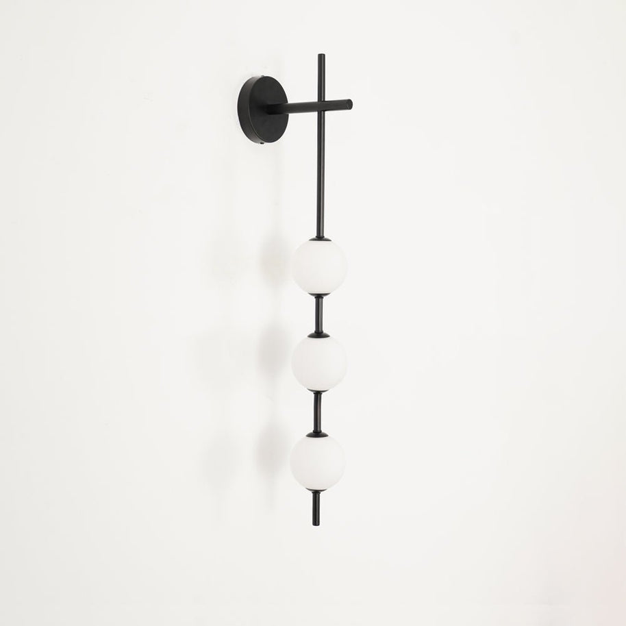 Solenne Vertical Globe Wall Light in Black, 3.9 in dia x H 30.7 in - Comvilo lighting