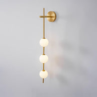 Solenne Vertical Globe Wall Light in Brass, 3.9 in dia x H 30.7 in - Comvilo lighting