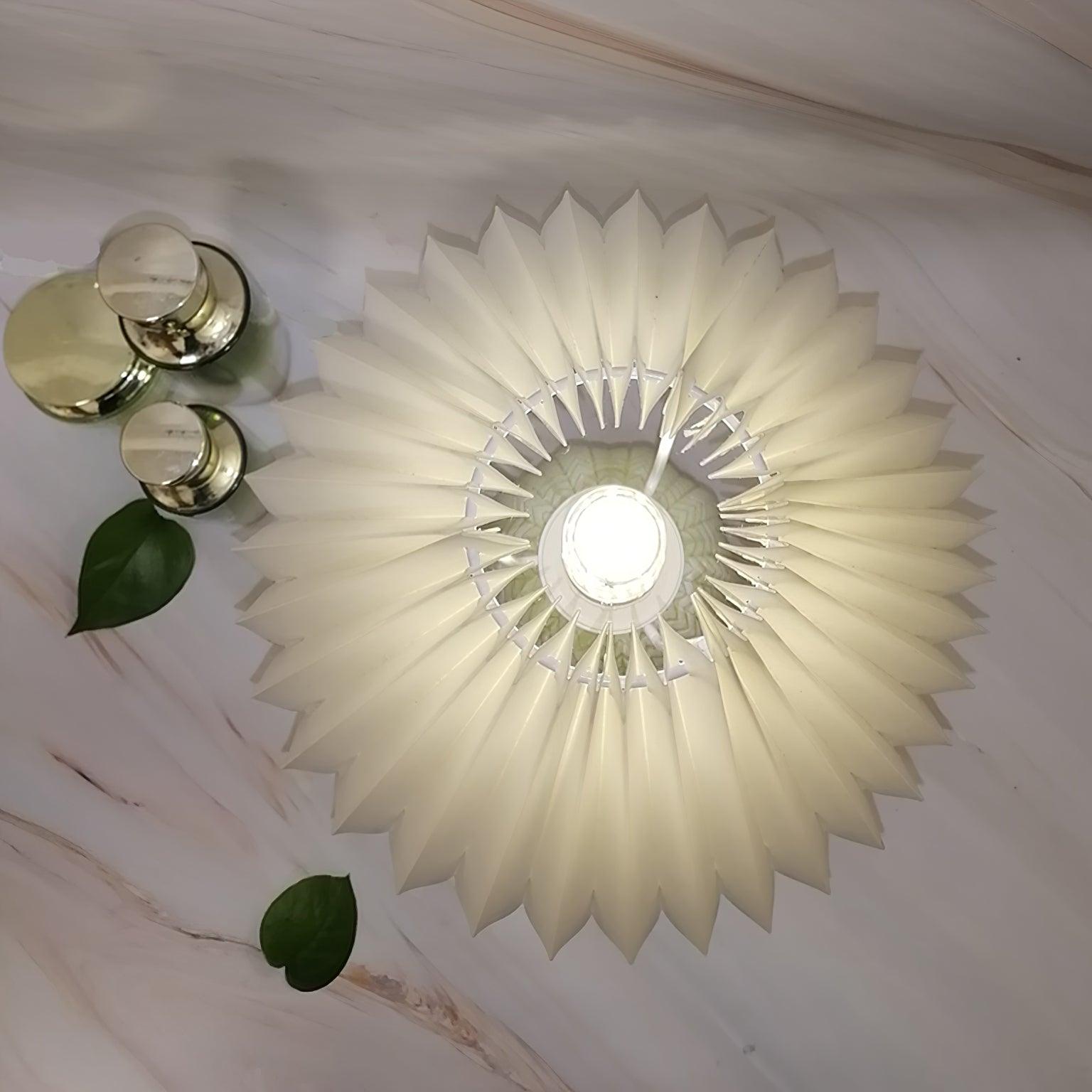 The plain cream shade seen from directly above, lit.
