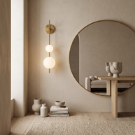 Solenne Vertical Globe Wall Light in a premium Comvilo lifestyle interior — carousel lifestyle image 2