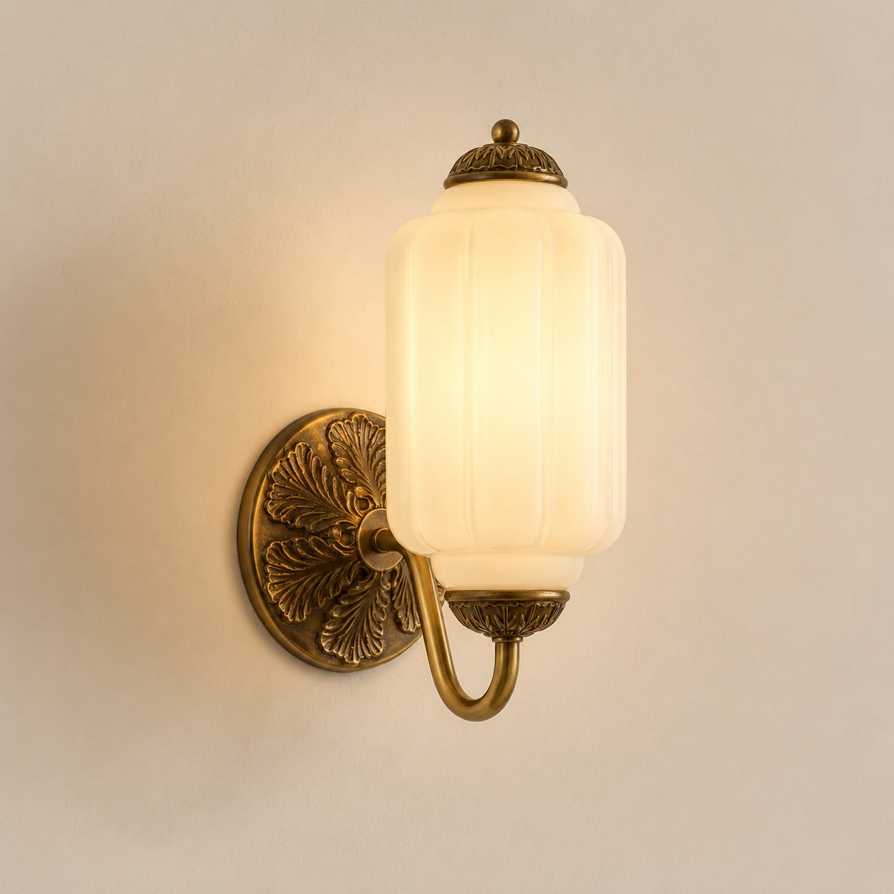 Bellemont Milk Glass Wall Sconce - lit studio image on white background for Comvilo lighting