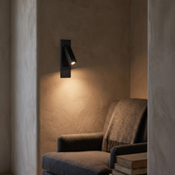 Valen Recessed Bedside Wall Sconce in a warm evening reading nook