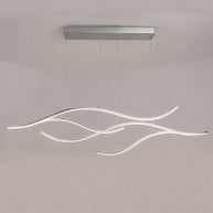 Linear pendant light made of wavy chrome-coloured LED bars hung from a slim rectangular canopy, lit, shown against a plain wall.