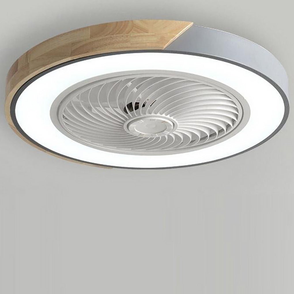 Round bladeless flush-mount ceiling fan with light in gray with a wood-grain section, light on, on a plain ceiling.