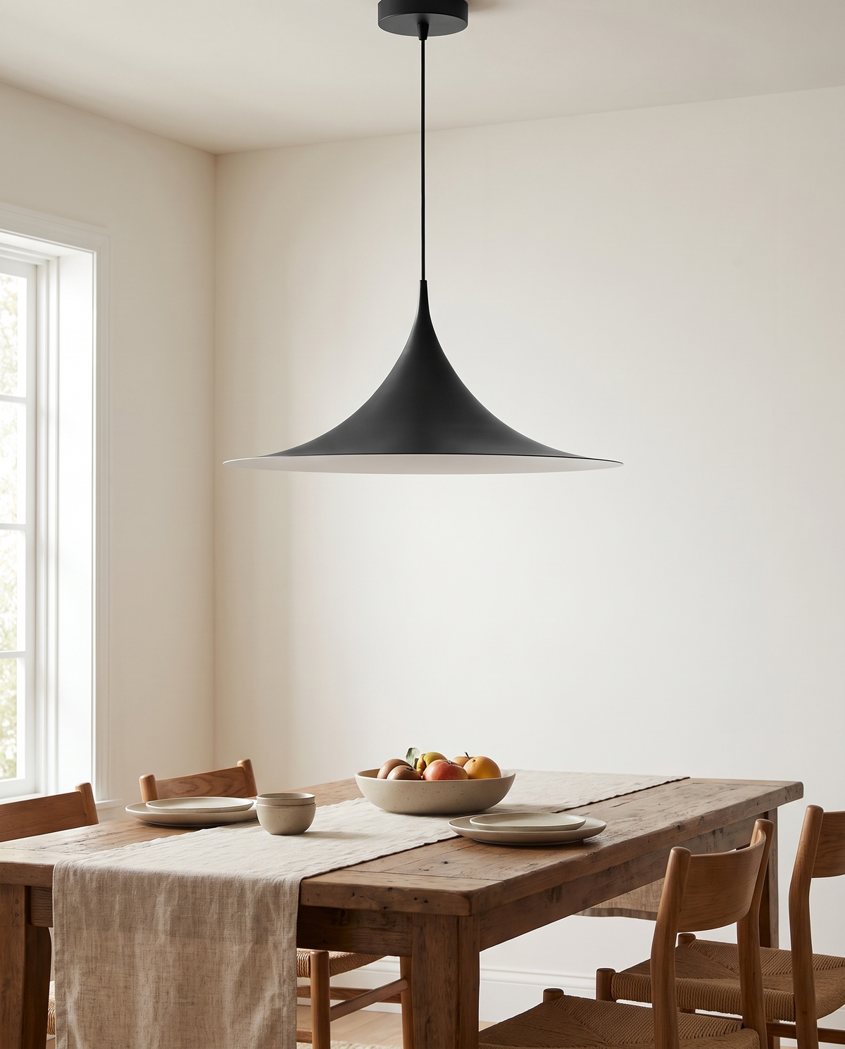 Quillane Flared Pendant Light in a dining room in soft daylight