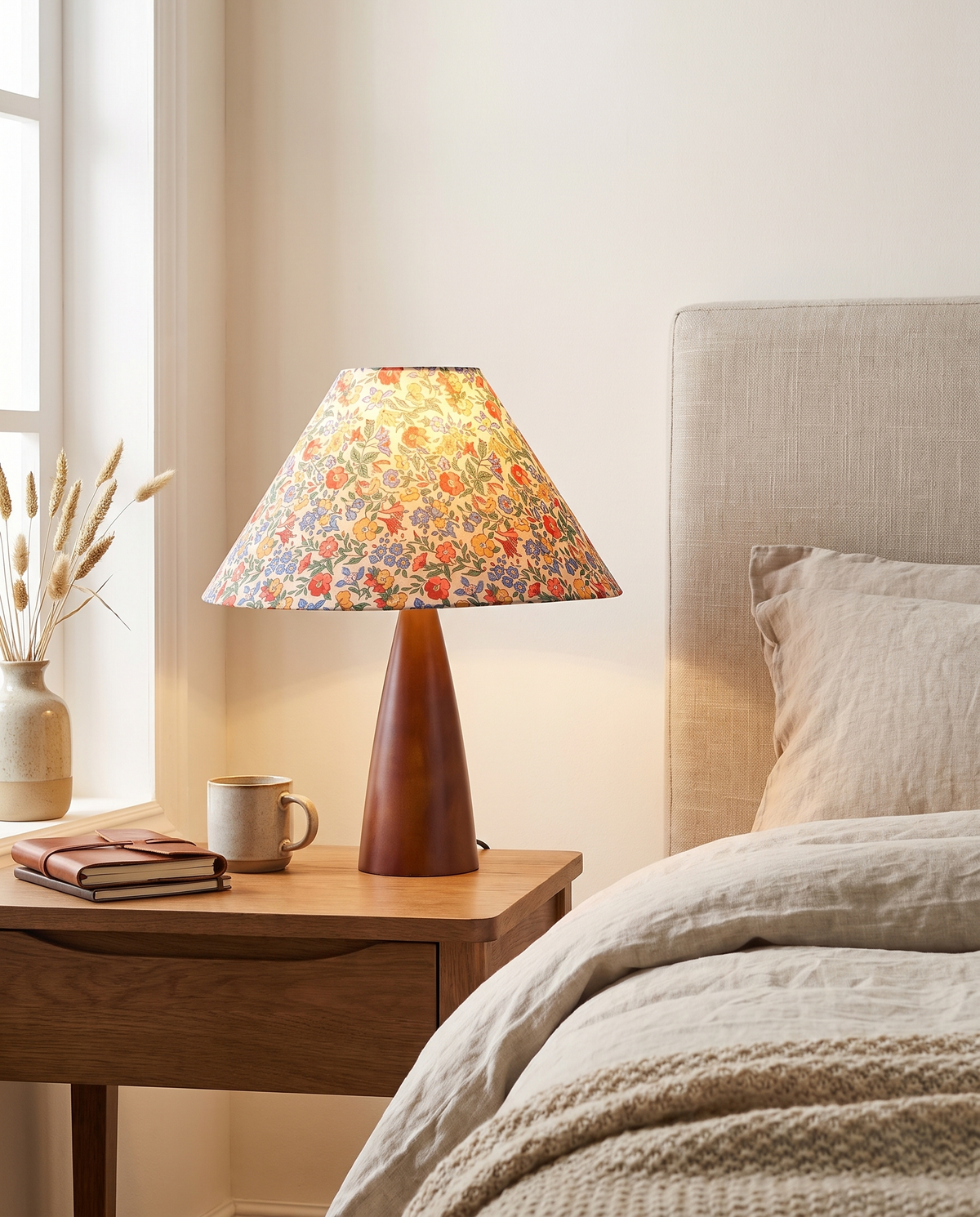 Fleurmont Floral Shade Table Lamp in a bedroom in soft daylight