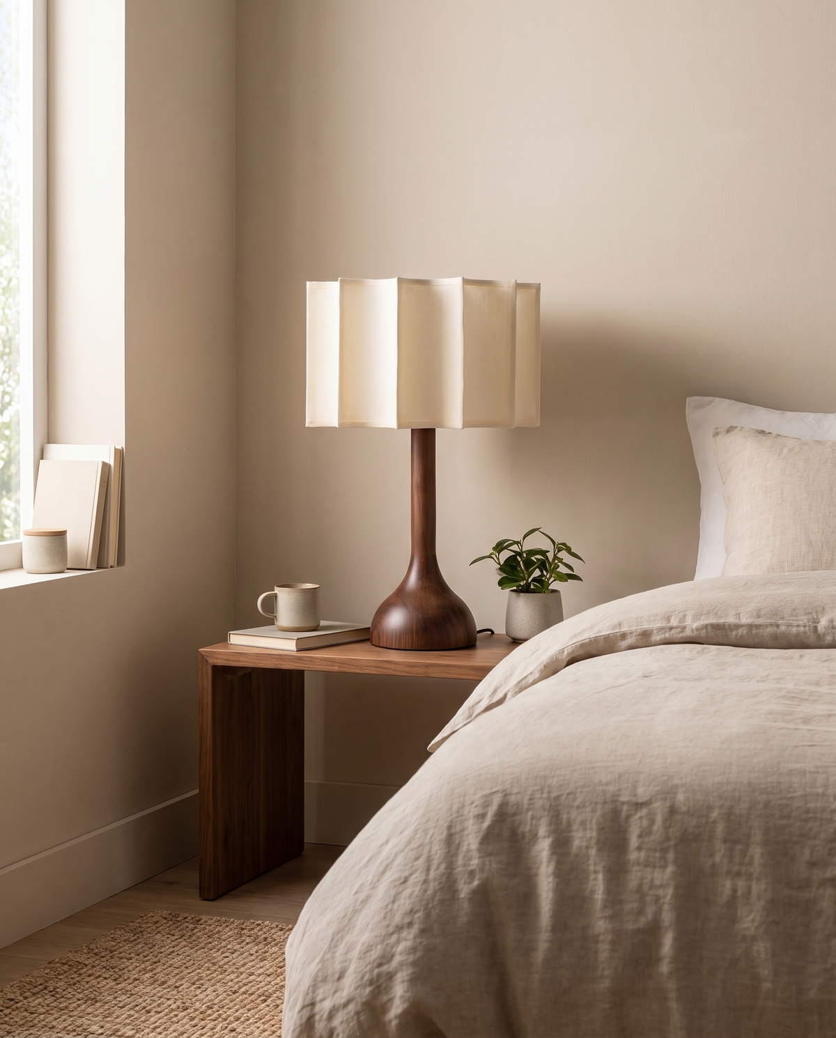 Clovelle Wood and Fabric Table Lamp in a bedroom in soft daylight