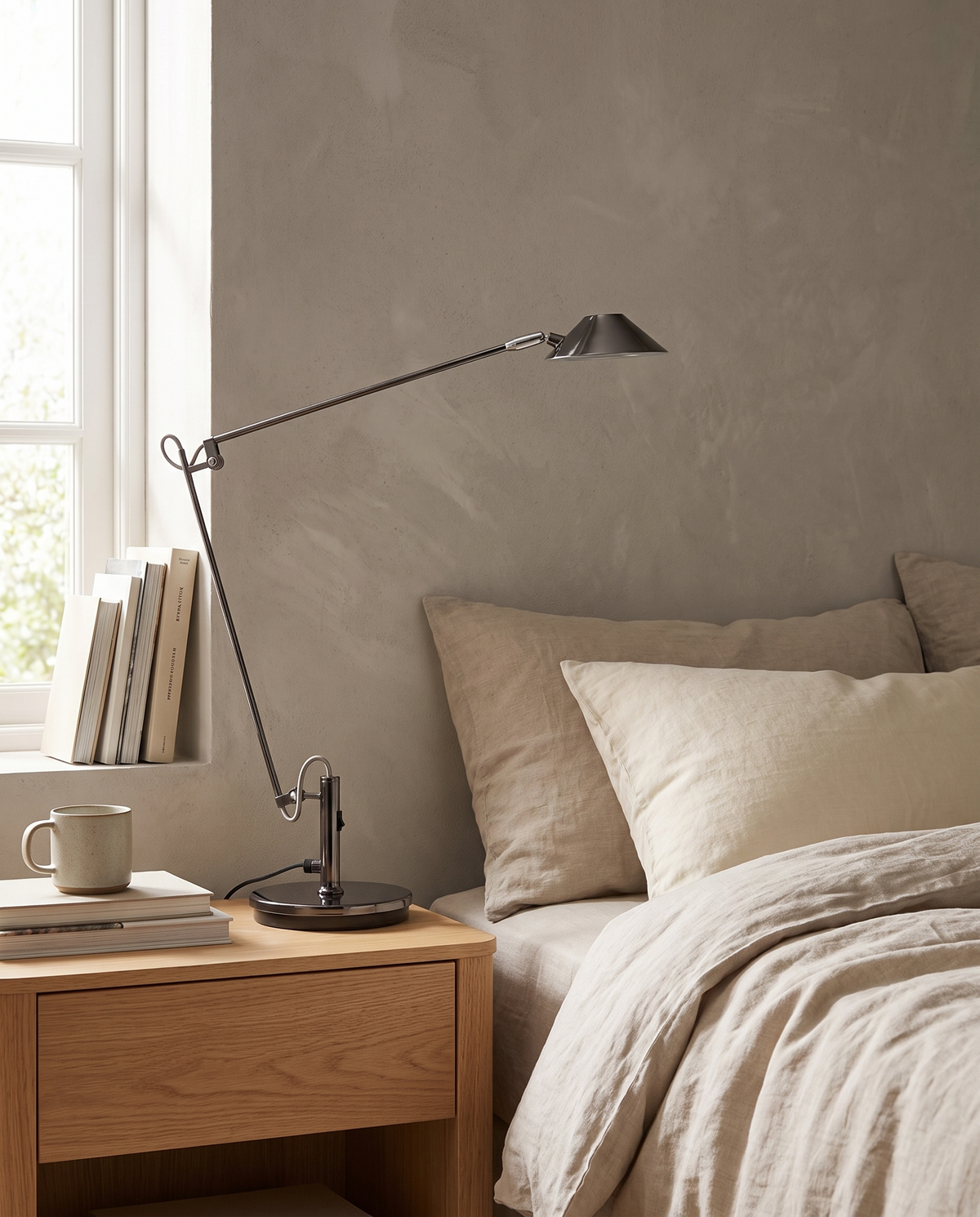 Taskara Adjustable Task Lamp in a bedroom in soft daylight