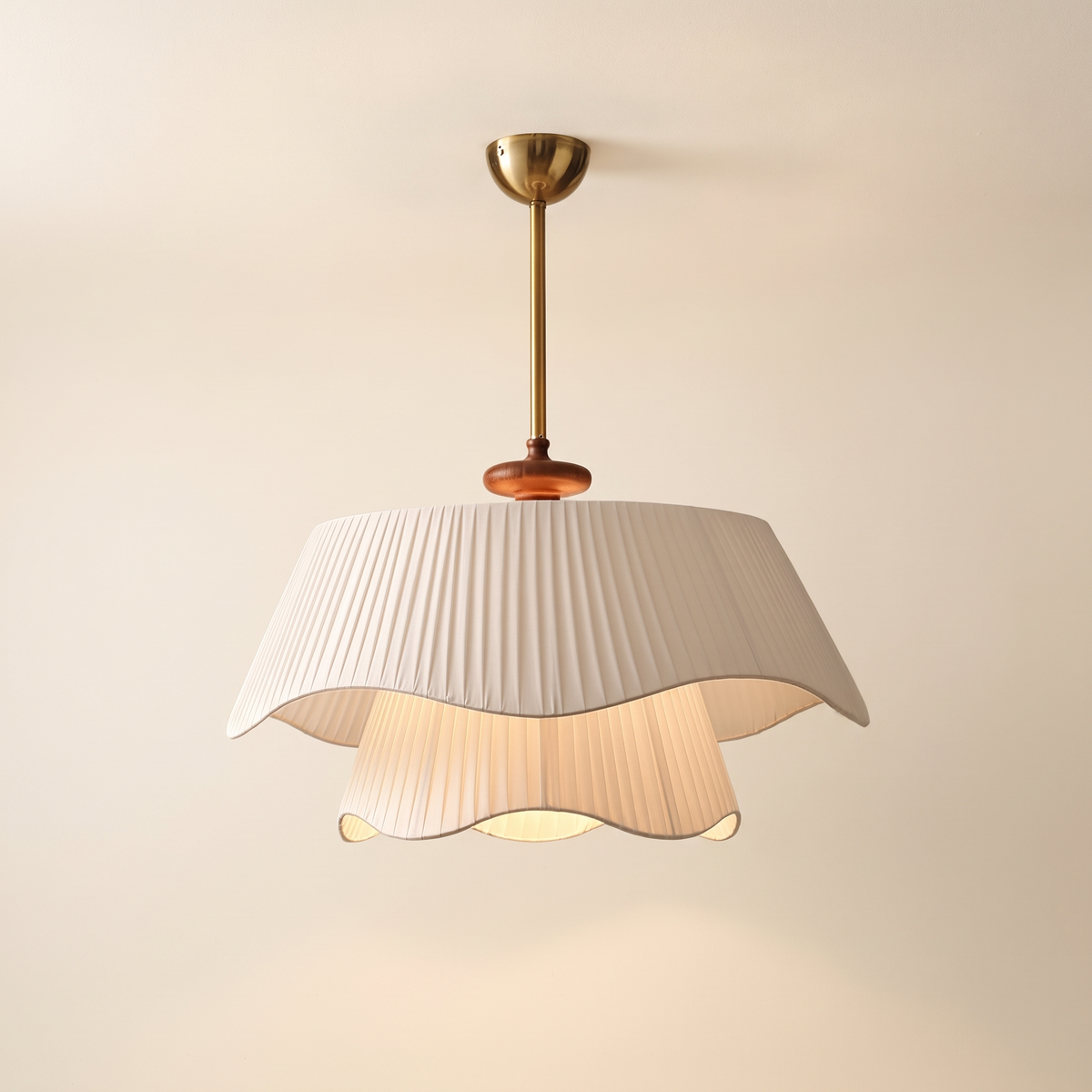 Frillane Scalloped Pleat Pendant Light: layered pendant with 2 tiers of cream pleated fabric shades with soft wavy scalloped hems, the upper tier wider than the lower