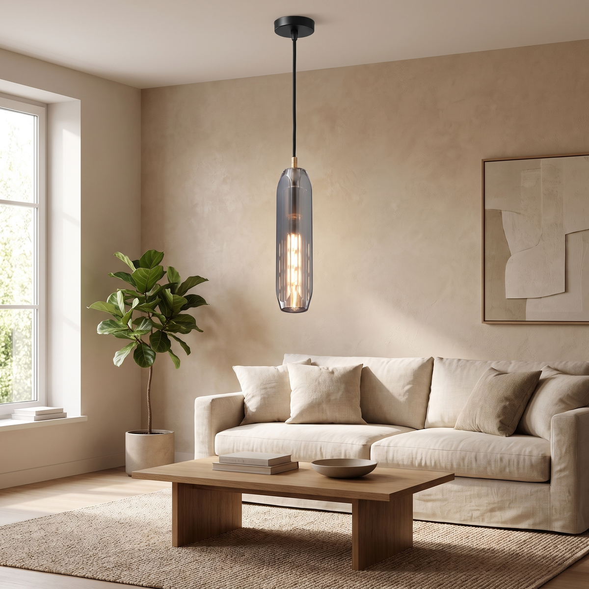 Facettia Faceted Crystal Pendant Light: single slim cylindrical smoke-grey faceted crystal pendant with a warm glowing filament inside and a brass top cap, on a black cord, shown in a living room