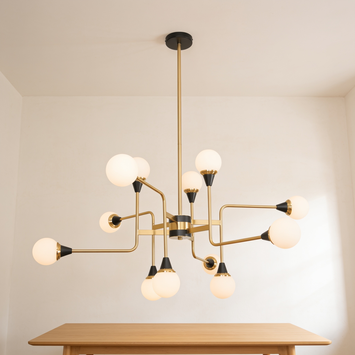 Estavrin Chandelier with twelve opal globes on brass arms above a dining table